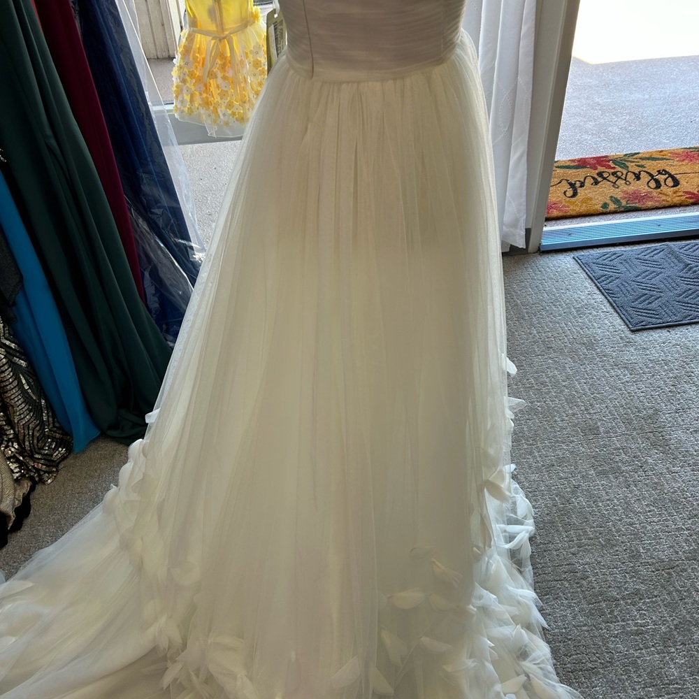 Wedding gowns sale 1299. Judy’s designers by the sea 949-324-2523